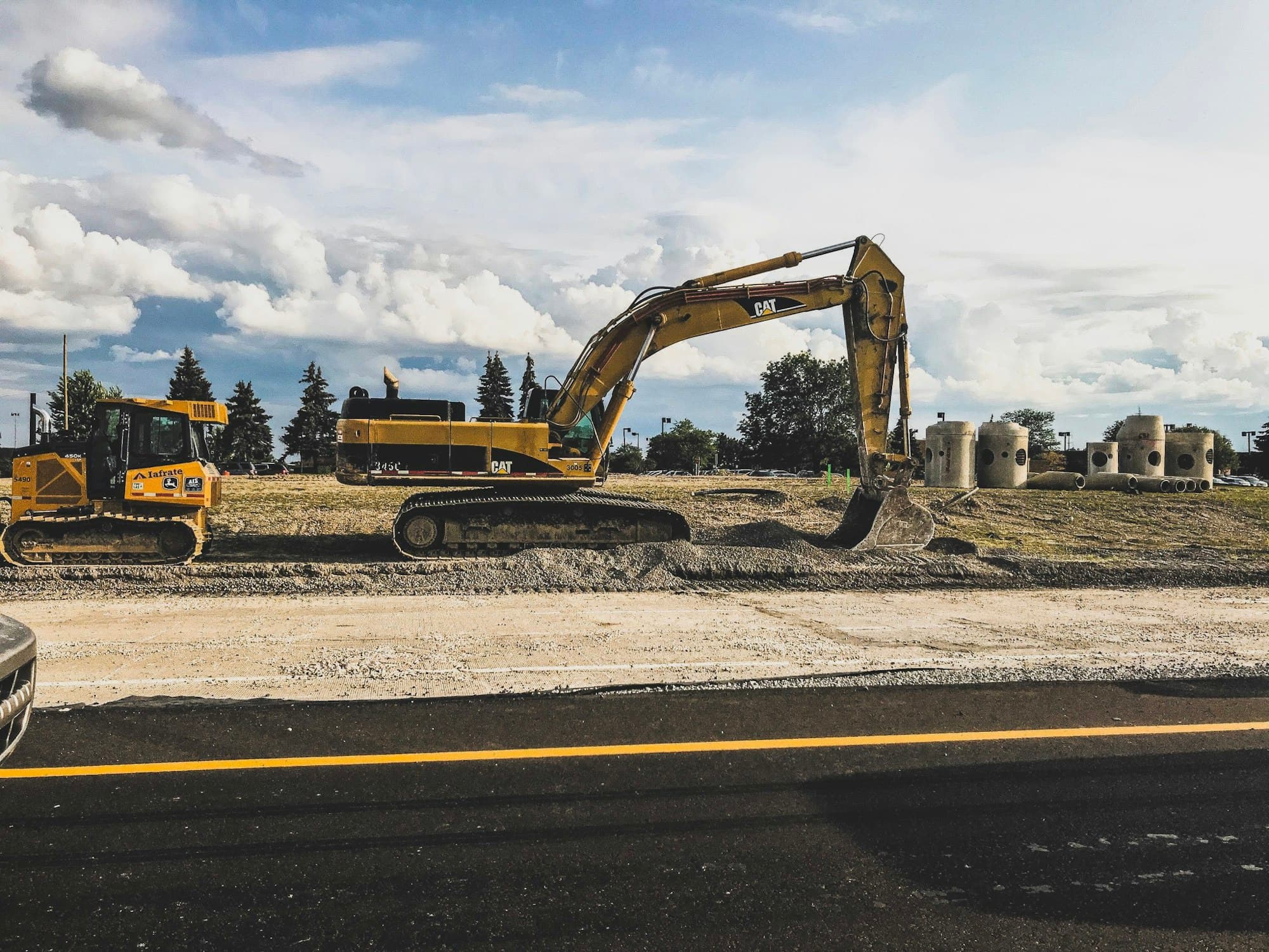 Excavator preparing a construction site